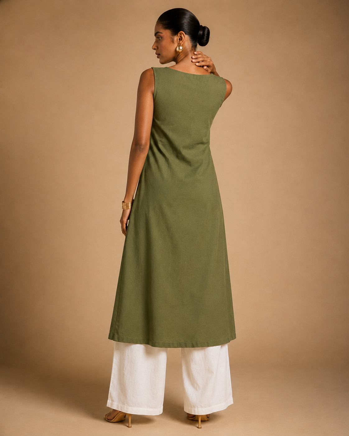 Back view of olive green Vanya front-slit kurti over cream wide-leg palazzo - Kavyaantra